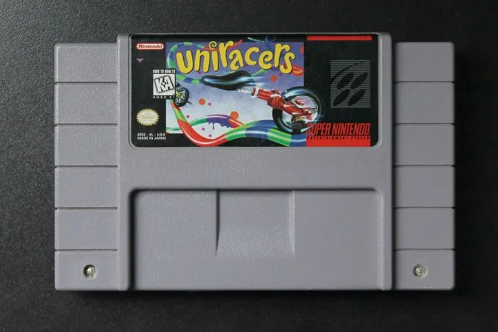 Super Nintendo game cartridge for Uniracers, representing skills people online needed before the 2000s but not anymore.