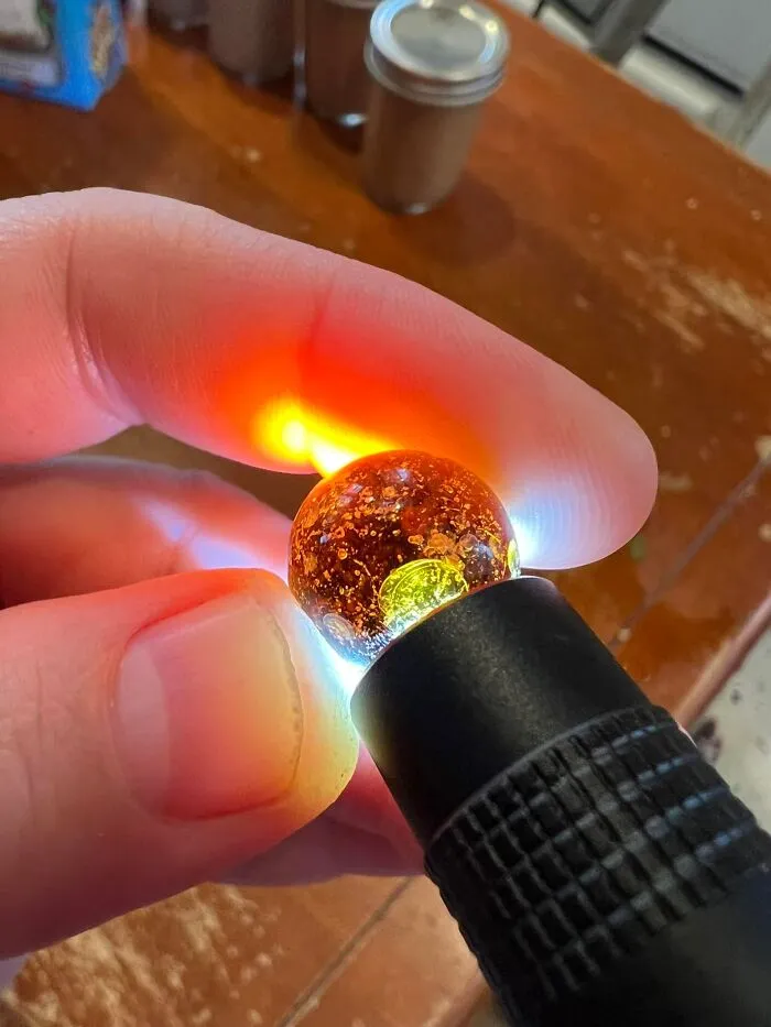 Amber Glass Marble. Found Under Dirt Just Outside My Basement Door. Was Gardening, Found It Sitting Right In Front Of Me After A Good Rain