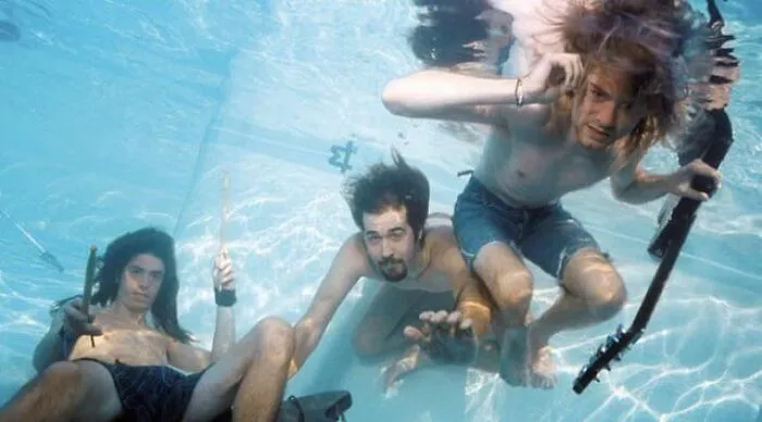 Nirvana durante la sesión de fotos para su álbum Nevermind, que se lanzó en 1991
