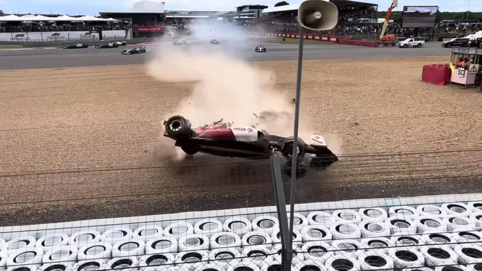 Race car flipping in a dramatic crash during a high-speed event, one of the most shocking moments on live television.