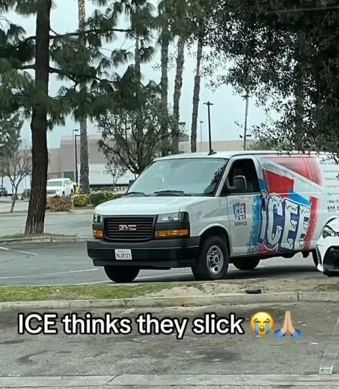 White GMC van with colorful ICEE branding parked outdoors near trees, humorously captioned with a meme about being Hispanic.