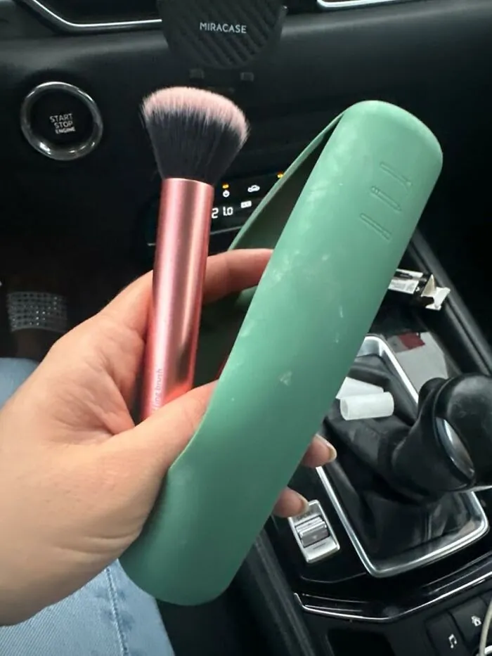 A Crucial Part Of The Hot Girl Summer Manifesto Is Ensuring The Inside Of Your Travel Tote Doesn't End Up Looking Like A Crime Scene From A Sephora Heist, Which Is The Specific Mission Of This <a Style="Display:inline;" Href="Https://Www.amazon.com/Feryes-Magnetic-Anti-Fall-Portable-Organizer/Dp/B0bg3zdx9j?ie=utf8&th=1&linkcode=ll1&tag=bpkangaroo-20&linkid=0e9f5b61f6ac5f16f541342bf4ad12e3&language=en_us&ref_=as_li_ss_tl" Target="_blank">    <span Style="Font: Inherit; Color: #d74b1f;"> Silicone Makeup Brush Bag</Span>