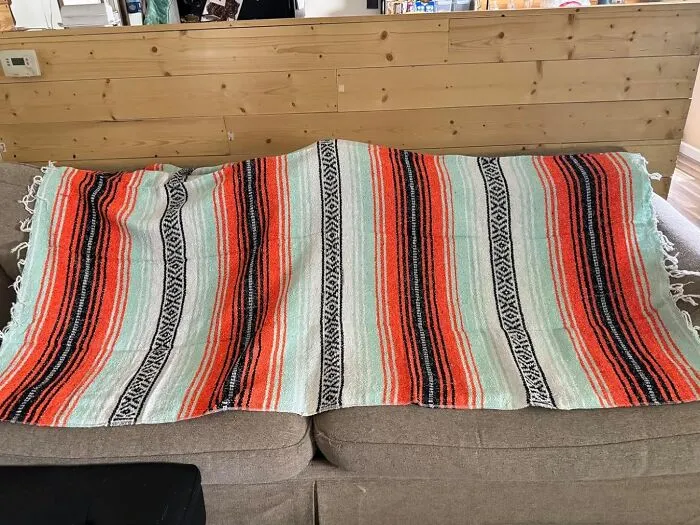 Your Living Room Is About To Achieve Peak Wanderlust Vibes With A <a Style="Display:inline;" Href="Https://Www.amazon.com/Mexican-Blanket-Authentic-Yoga-Blankets/Dp/B072lv1q9x?ie=utf8&th=1&linkcode=ll1&tag=bpworm-20&linkid=83b5a34c9f0cc1938a50fc9a60e20d79&language=en_us&ref_=as_li_ss_tl" Target="_blank">    <span Style="Font: Inherit; Color: #d74b1f;"> Handwoven Mexican Blanket </Span>