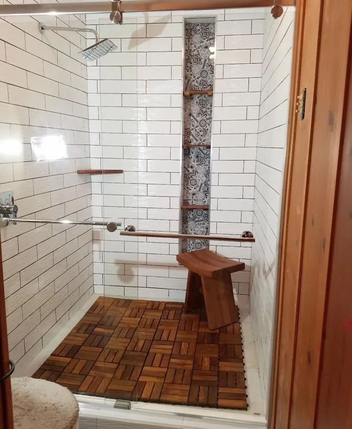 That Sad Concrete Balcony Can Finally Have Its Main Character Moment And Rebrand As A Luxury Spa Deck With These <a Style="Display:inline;" Href="Https://Www.amazon.com/Bare-Decor-Bare-Wf2009-Interlocking-Flooring/Dp/B00j8slw16?ie=utf8&th=1&linkcode=ll1&tag=bpfig-20&linkid=5f9ca464b2f13f5fa1b0655f93dc449d&language=en_us&ref_=as_li_ss_tl" Target="_blank">    <span Style="Font: Inherit; Color: #d74b1f;"> Teak Interlocking Floor Tiles</Span>
