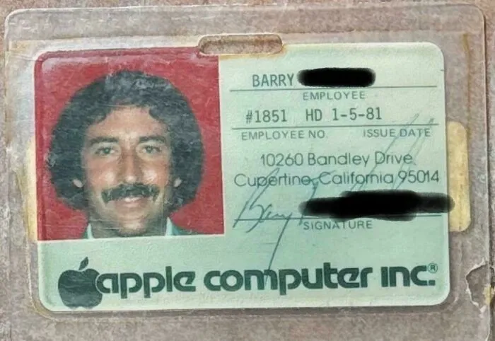 Vintage Apple employee ID badge from the early 1980s showing retro logo and company details, a mildly interesting find.