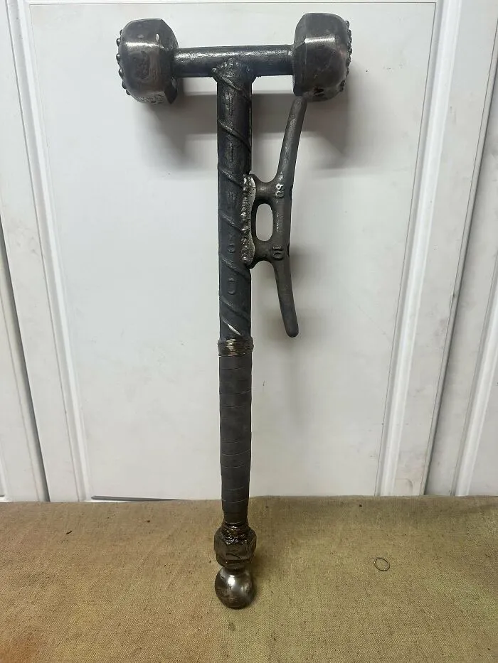 Homemade tool crafted with metal parts showcasing redneck engineering and creative MacGyvering skills.
