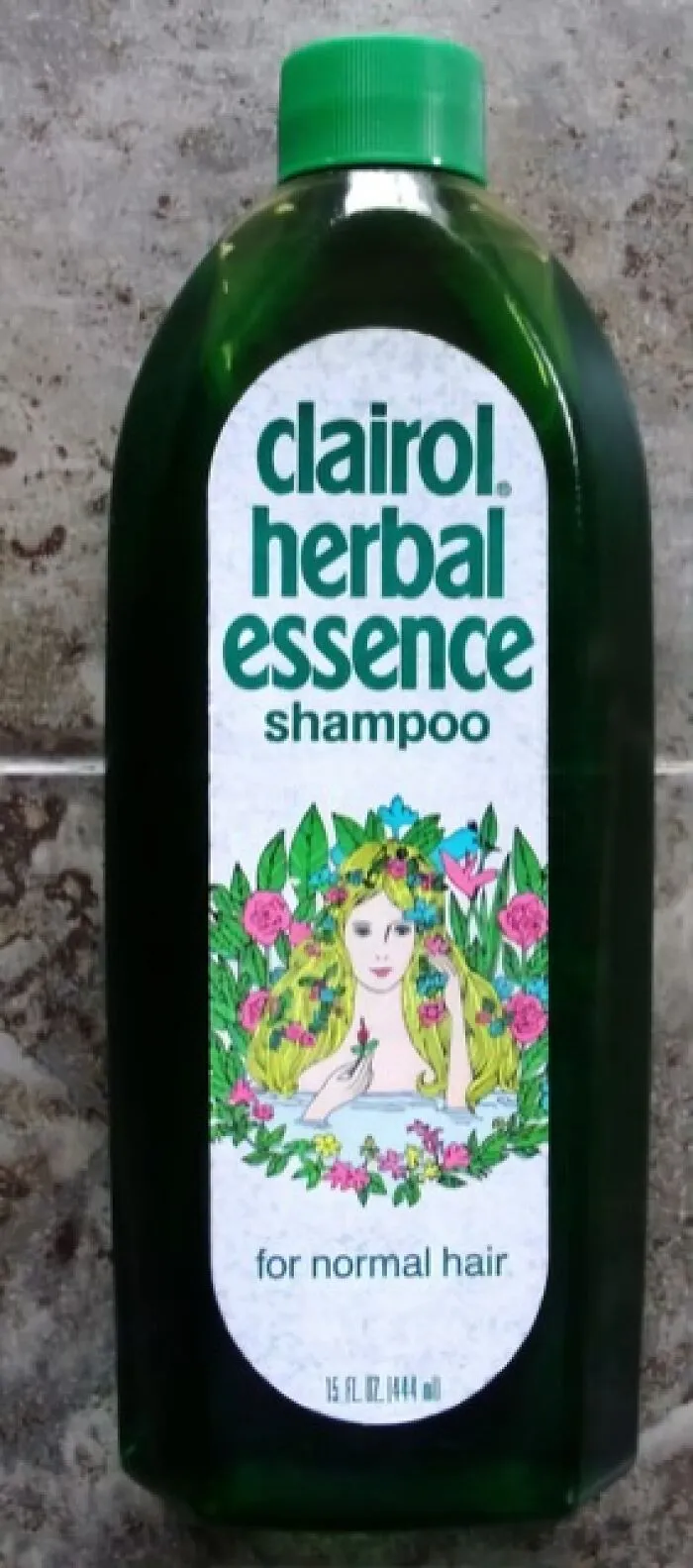 Vintage Clairol herbal essence shampoo bottle with floral illustration, a classic vintage thing from the 1970s collection.