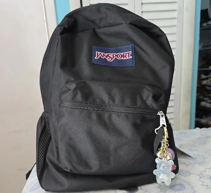 A <a Style="Display:inline;" Href="Https://Www.amazon.com/Jansport-Cross-Town-Navy-Size/Dp/B0823wbv12?ie=utf8&th=1&linkcode=ll1&tag=bpgnu-20&linkid=cd482e647e9e5e5ad4fd74d784b878de&language=en_us&ref_=as_li_ss_tl" Target="_blank"> <span Style="Font: Inherit; Color: #d74b1f;"> Jansport Cross Town Backpack</Span> Is Basically A Rite Of Passage, Like Getting Your Driver's License Or Having Your First Existential Crisis Over A Group Project