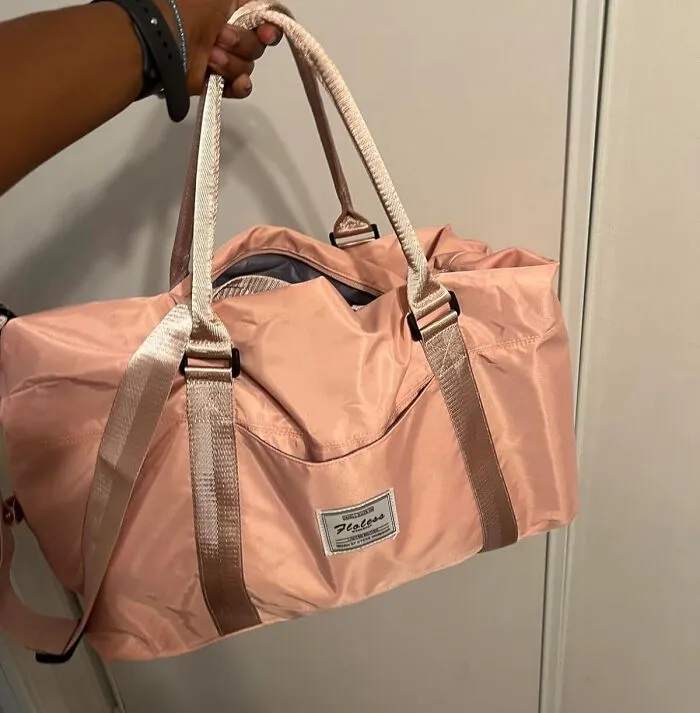 Showing Up For A Weekend Getaway With A <a Style="Display:inline;" Href="Https://Www.amazon.com/Travel-Duffel-Sports-Shoulder-Pink8/Dp/B07ys438fv?ie=utf8&linkcode=ll1&tag=bpkangaroo-20&linkid=c91fdf4298a8e911f590bccb5741e111&language=en_us&ref_=as_li_ss_tl" Target="_blank">    <span Style="Font: Inherit; Color: #d74b1f;"> Chic Weekend Duffel Bag</Span> Instead Of A Sad, Old Gym Bag Sends A Clear Message: My Life Is Together, And Yes, I Did Remember To Pack A Skincare Routine