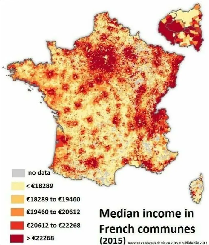Heat map showing median income distribution across French communes in 2015 with varying income levels highlighted in shades.