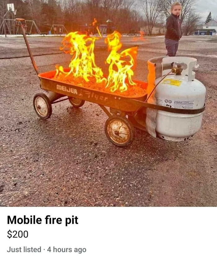 Mobile fire pit made from a red wagon with a propane tank, demonstrating creative redneck engineering outdoors.