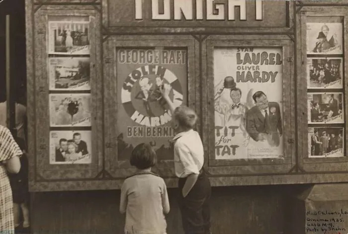 A Couple Of Kids Standing In Front Of A Poster, New Orleans, Louisiana, 1935