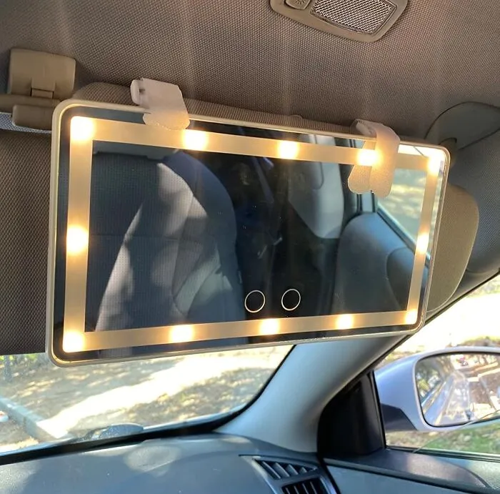 Trying To Do Your Eyeliner In The Car's Gloomy Dome Light Is A Canon Event You Can Now Disrupt With A <a Style="Display:inline;" Href="Https://Www.amazon.com/Vanity-Cosmetic-Battery-Rechargeable-Dimmable/Dp/B08yqxy7cz?ie=utf8&th=1&linkcode=ll1&tag=bpwombat-20&linkid=61caf8f37d99cf904cd3dc4a1999b7f6&language=en_us&ref_=as_li_ss_tl" Target="_blank">  <span Style="Font: Inherit; Color: #d74b1f;"> Car Sun Visor Vanity Mirror With Lights </Span>