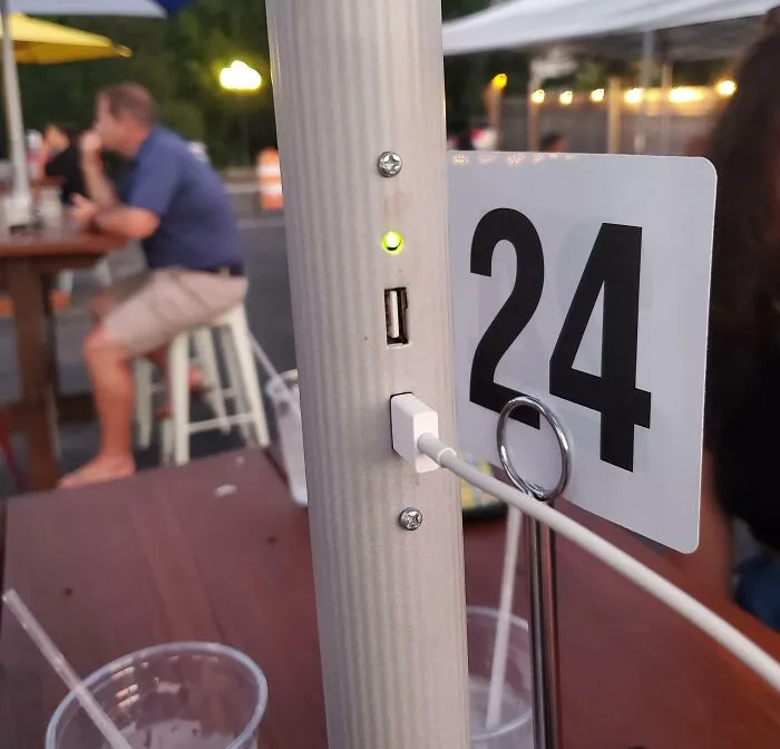 This Handy Outdoor Umbrella Doubles As A <a Style="Display:inline;" Href="Https://Www.amazon.com/Charger-Charging-Station-Adapter-iPhone/Dp/B0bdlljbdq?content-ID=amzn1.sym.c8b39f81-Ded8-4d75-80c2-6dfa03cbb699%3aamzn1.sym.c8b39f81-Ded8-4d75-80c2-6dfa03cbb699&crid=1n524f6ex7a2p&cv_ct_cx=phone%2bchargers%2bwall&keywords=phone%2bchargers%2bwall&pd_rd_i=b0bdlljbdq&pd_rd_r=0adb760a-9972-4cba-8e2d-382ff2bec62e&pd_rd_w=jnzv2&pd_rd_wg=9s6nc&pf_rd_p=c8b39f81-Ded8-4d75-80c2-6dfa03cbb699&pf_rd_r=anj7deeeqxkdfn4jmj05&qid=1753792733&sbo=rzvfv%2f%2fhxdf%2bo5021pansa%3d%3d&sprefix=phone%2bchargers%2bwall%2caps%2c198&sr=1-1-5190daf0-67e3-427c-Bea6-C72c1df98776&th=1&linkcode=ll1&tag=bplobster-20&linkid=1ef1429525dcde2d65a173fe5b559559&language=en_us&ref_=as_li_ss_tl" Target="_blank">  <span Style="Font:inherit;color:#d74b1f;"> Charging Station </Span>, All Powered By The Sun!