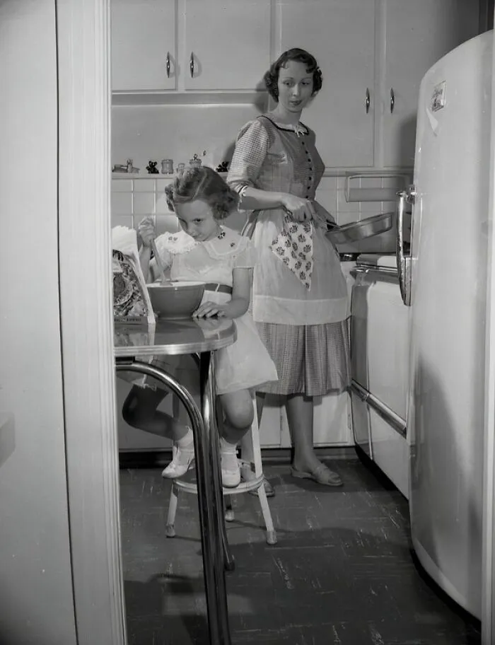 Jean Gatlin And Daughter Margaret Ellen (Age 5) In The Kitchen In Tallahassee, Florida