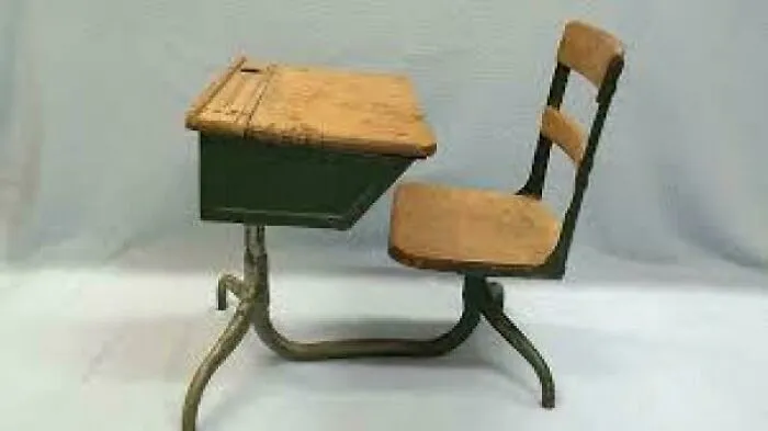 If You Know What The Hole At The Top Right Corner Of This Desk Is For