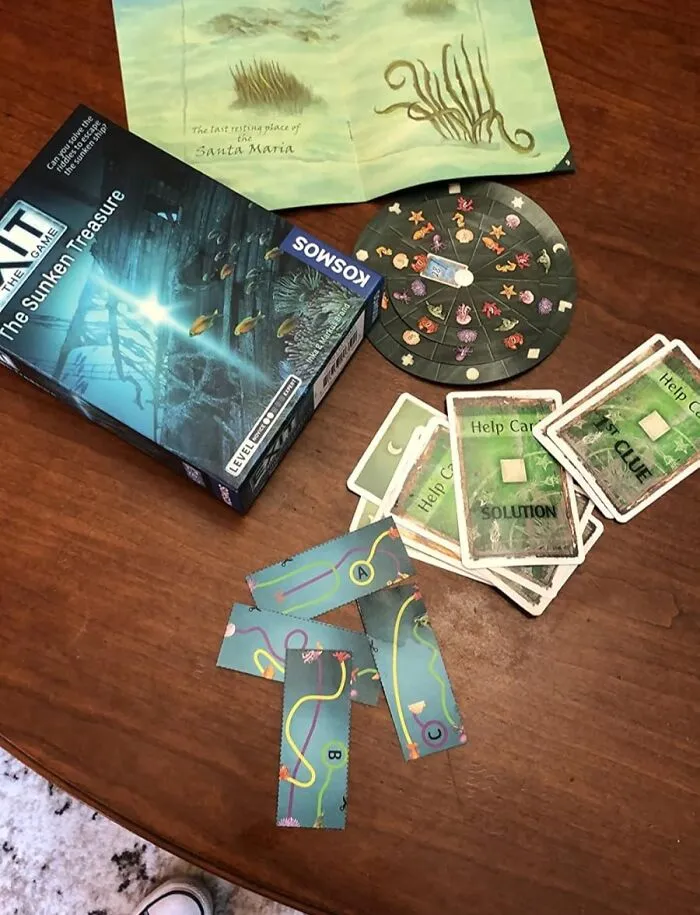 You And Your Friends Can Have A Blast Arguing Over Cryptic Clues Without Leaving The House Thanks To <a Style="Display:inline;" Href="Https://Www.amazon.com/Thames-Kosmos-Exit-Treasure-Multiplayer/Dp/B07b7ttq7v?ie=utf8&linkcode=ll1&tag=bpaxolotl-20&linkid=abd4ce4fdabdec1f629901d4b1989871&language=en_us&ref_=as_li_ss_tl" Target="_blank">  <span Style="Font: Inherit; Color: #d74b1f;"> The Sunken Treasure Escape Room Game</Span>