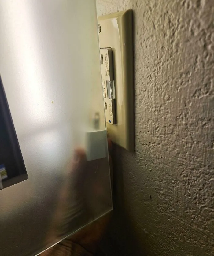 Hotel Mirror Blocks The Only Outlet In The Bathroom