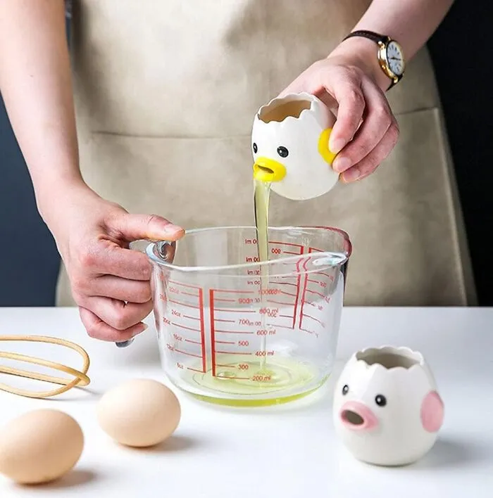 Separating Eggs Can Go From A Messy, Stressful Ordeal To A Slightly Gross But Hilarious Process With A <a Style="Display:inline;" Href="Https://Www.amazon.com/Luococo-Separator-Practical-Household-Dishwasher/Dp/B094ntcsdj?dib=eyj2ijoimsj9.a3wz2puljxpl-Pbxd157i4-7gtzvxyxjjk0nanrfevpblglwznewsibzkqdztc_0sur67hxrj1wmuwp_chp9kvyfcolajjcpnppimb751fz2lhthfm30eto3awktbjxkwakdfrlmu3lntvroaib0lvmpruzc7qh5cixbhg73r7uxluiiw1_qb9j-Shcx3v1qvqlpleldezvlj2qv-Gaxy-V8-Xdidc2aqccqzcyuf6ymohfq03an026qms_sexkpvcefk_tti7zb5undunoouotghvkugcgg_tj1dajlpqs.emkyrjrsqk3djv_lhsjmqkjgedgs6brumdwnpxrgmoq&dib_tag=se&keywords=weird%2bkitchen%2bgadgets&qid=1753430311&sr=8-7&th=1&linkcode=ll1&tag=artandesignews-20&linkid=0c266b457408328cc224d3bad5d4cbe1&language=en_us&ref_=as_li_ss_tl" Target="_blank">  <span Style="Font: Inherit; Color: #d74b1f;"> Cute Chick Egg Separator </Span>
