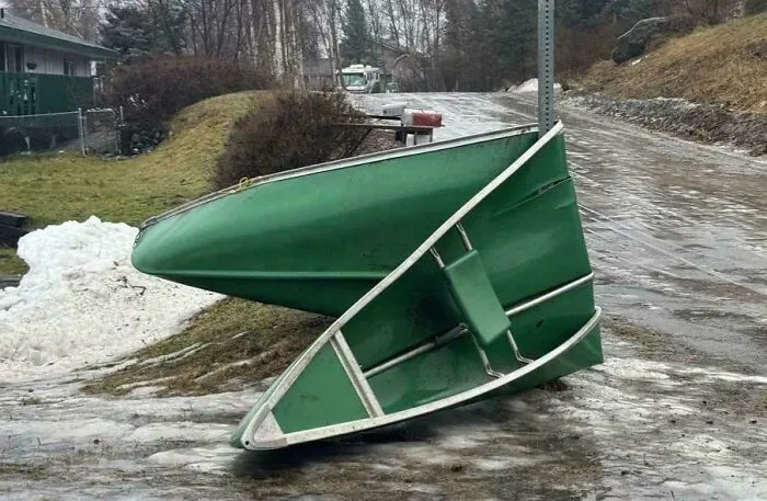 Alaskan Winds Took And Wrapped Someone’s Canoe Around A Pole