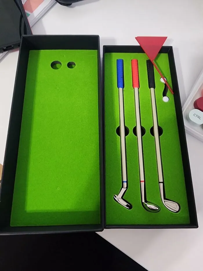 Look Like You're Pondering Important Business Decisions When You're Actually Lining Up A Putt With A <a Style="Display:inline;" Href="Https://Www.amazon.com/Mini-Desktop-Golf-Set-Christmas/Dp/B09t39w736?ie=utf8&linkcode=ll1&tag=bpturtle-20&linkid=62d02b4cacdec86d8619872e10c8d68d&language=en_us&ref_=as_li_ss_tl" Target="_blank">  <span Style="Font: Inherit; Color: #d74b1f;"> Mini Desktop Golf Set </Span>