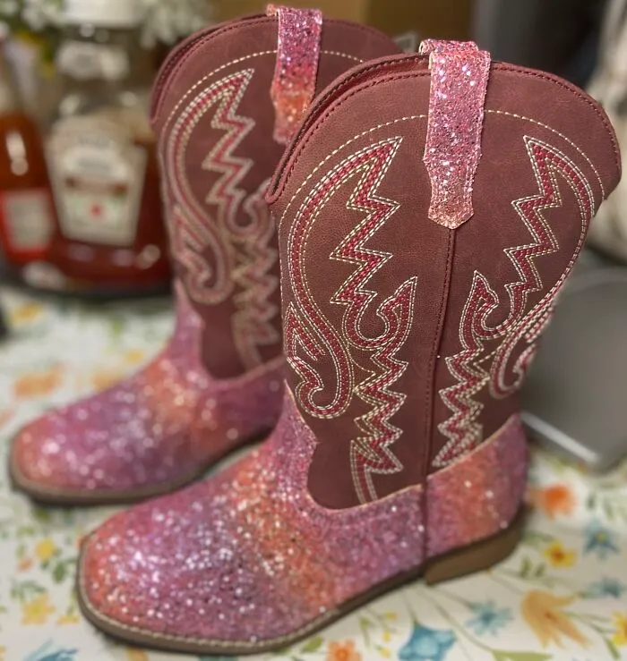 The Official Uniform For Your "Yeehaw" Era Has Arrived And It's A Pair Of<a Style="Display:inline;" Href="Https://Www.amazon.com/Atsroel-Cowgirl-Embroidered-Western-Toddler/Dp/B0df56gk9w?ie=utf8&th=1&psc=1&linkcode=ll1&tag=bpraccoon-20&linkid=3ba9fce75e1137a7eae0156eb481401b&language=en_us&ref_=as_li_ss_tl" Target="_blank">   <span Style="Font: Inherit; Color: #d74b1f;"> Glitter Cowboy Boots </Span>