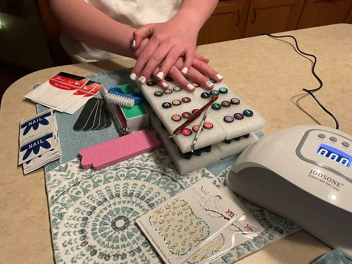 Your Bank Account's New Favorite Hobby Is You Becoming Your Own Personal Nail Tech With A <a Style="Display:inline;" Href="Https://Www.amazon.com/Polish-Light-Include-Colors-Manicure/Dp/B097bskn9p?ie=utf8&th=1&linkcode=ll1&tag=bpaxolotl-20&linkid=8c101dbcfd3ecb0e99b0145e9b012d64&language=en_us&ref_=as_li_ss_tl" Target="_blank">  <span Style="Font: Inherit; Color: #d74b1f;"> Gel Nail Polish Kit With U V Light </Span>