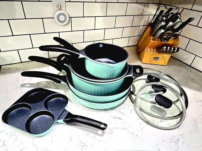 The Daily Game Of Cookware Jenga You've Been Losing Against Your Cabinet Is Finally Over Thanks To This <a Style="Display:inline;" Href="Https://Www.amazon.com/Carote-Cookware-Detachable-Kitchen-Removable/Dp/B0ddt9tj19?ie=utf8&th=1&linkcode=ll1&tag=bpmonkey-20&linkid=2872738466375c590bd92cfaf95a1f9c&language=en_us&ref_=as_li_ss_tl" Target="_blank">  <span Style="Font: Inherit; Color: #d74b1f;"> 7-Piece Cookware With A Detachable Handle </Span>