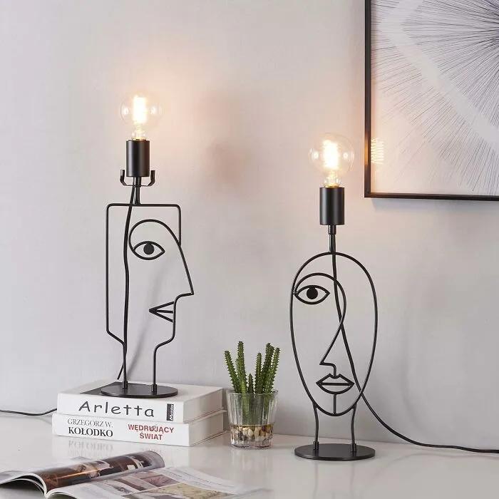 The Music Video For A-Ha's "Take On Me" Has Officially Entered Its Home Decor Era With These <a Style="Display:inline;" Href="Https://Www.amazon.com/Dp/B08zmpttxg?ascsubtag=6133264%2c29%2c45%2cd%2c0%2c0%2c0%2c1396%3a1%3b900%3a2%3b974%3a1%3b1338%3a1%2c17673768%2c0%2c0&th=1%25252cgoogle%252cgoogle%2cgoogle&btn_ref=srctok-Dcebacf5f2a08b86&linkcode=ll1&tag=bpfig-20&linkid=ce5db3361fdce7efbc7a075248cc73ce&language=en_us&ref_=as_li_ss_tl" Target="_blank">    <span Style="Font: Inherit; Color: #d74b1f;"> Abstract Line Art Table Lamps</Span>
