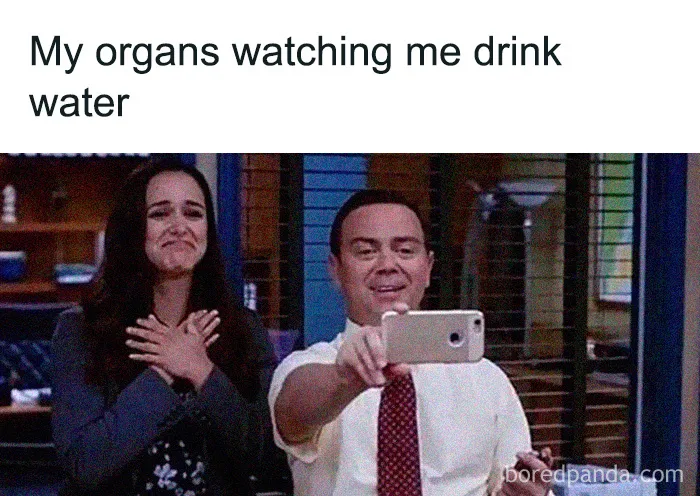 Two people smiling and taking a selfie, representing medical memes to laugh about healthcare expenses.