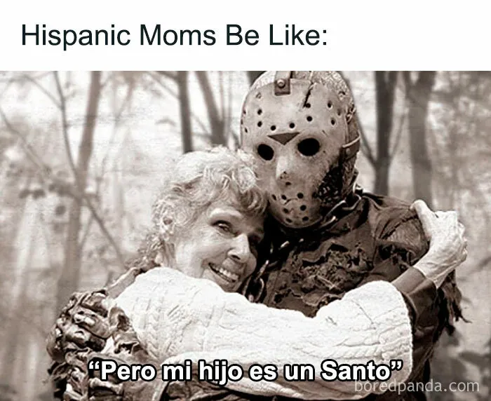 Hispanic moms hugging horror character with caption humorously reflecting Hispanic family memes experience.