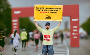 Latvian Rapper Stops Short Of Marathon Finish Line To Highlight A Heartbreaking Truth About Education