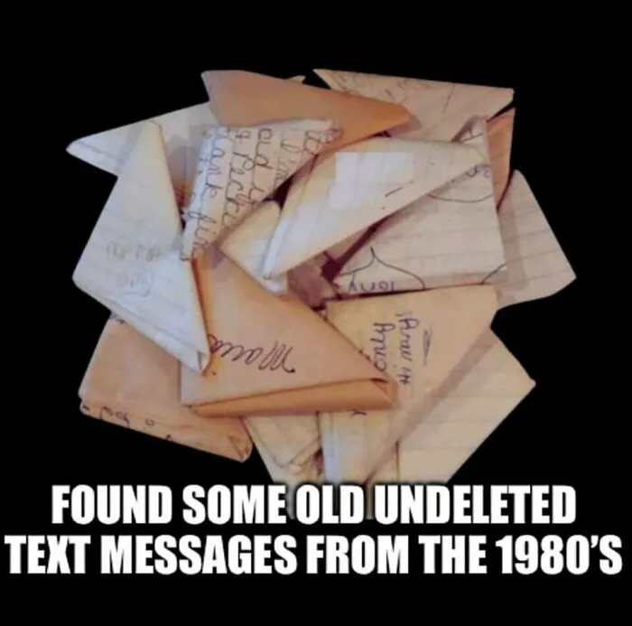 Folded paper notes from the 1980s representing nostalgic good old days communication before digital messages.