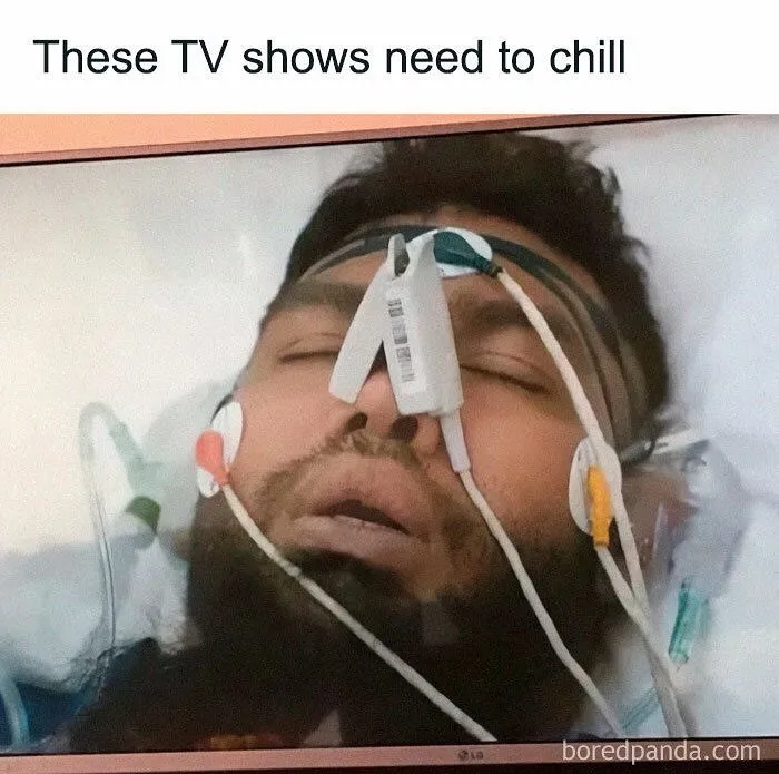 Man in hospital bed with medical sensors attached, illustrating healthcare expenses through a medical meme.
