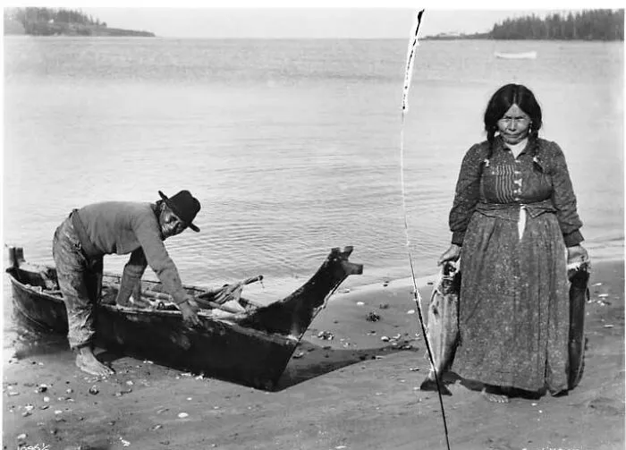 Makah Man And Woman With Canoe And Fish, Ca 1900