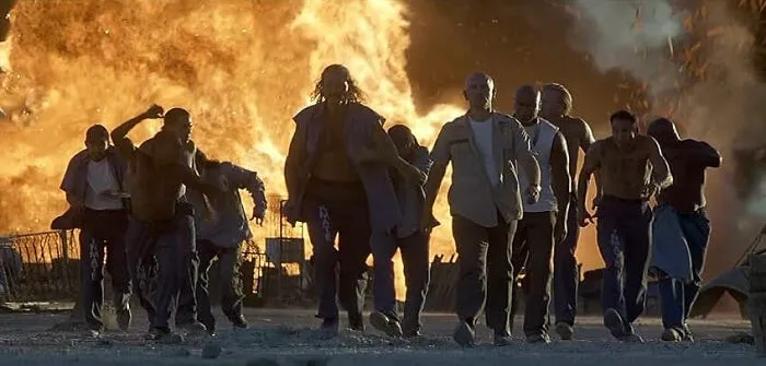The Hero Walks Away In Slo-Mo From An Explosion Without Looking Back