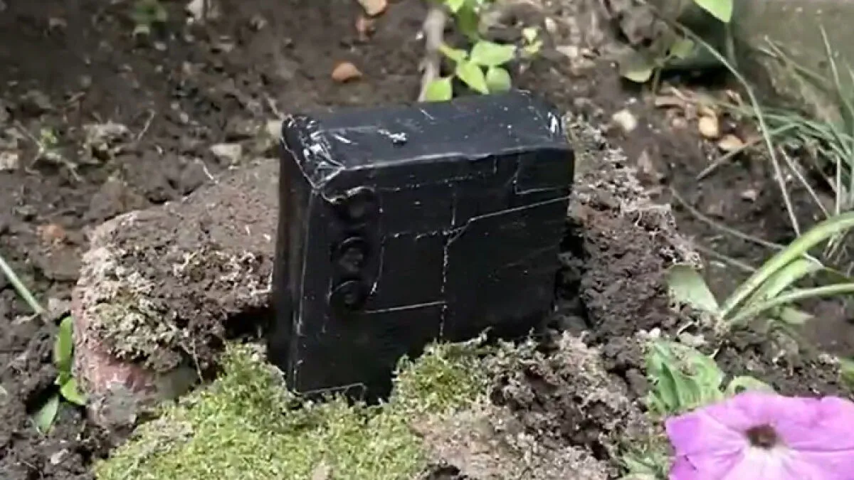 Woman Discovers Phone Buried In Her Yard As Police Warn Of Disturbing New Trend