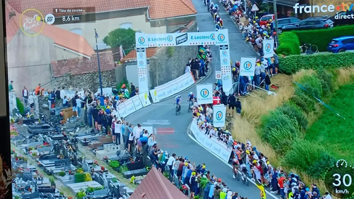 "What A Disgrace!": Tour De France Fans Spark Outrage After Standing On Graves For Better View