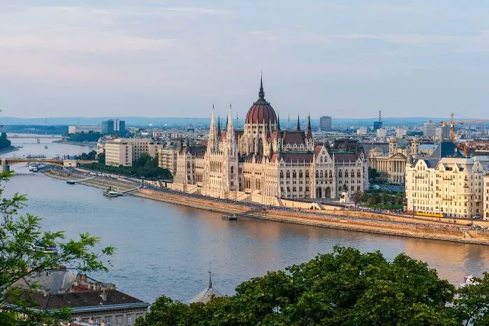 Panoramic view of one of the smartest countries with historic architecture along a river shaping the future of the world.