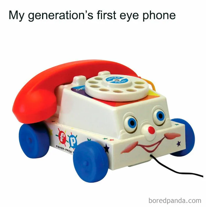 Vintage Fisher-Price toy phone with a rotary dial and wheels, evoking good old days nostalgia for '80s kids.