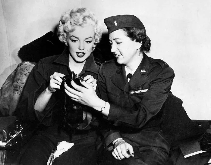 Marilyn Monroe Learns How To Use An Oxygen Mask Aboard An Air Force Jet To Korea Where She Entertained The Troops, U.S. Air Force Photo, 1954