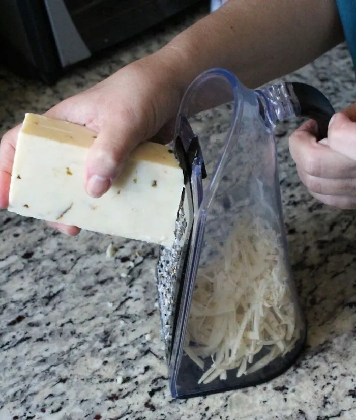 Your Cheese And Garlic Prep Can Be A Mess-Free, Container-Catching Dream With This Genius <a Style="Display:inline;" Href="Https://Www.amazon.com/Joined-Cheese-Grater-Garlic-Crusher/Dp/B0bp7md6qb?ie=utf8&linkcode=ll1&tag=bpsalmon-20&linkid=cc835d05378e2382dc4df3404ffc6789&language=en_us&ref_=as_li_ss_tl" Target="_blank">  <span Style="Font: Inherit; Color: #d74b1f;"> Cheese Grater And Garlic Crusher Combo</Span>