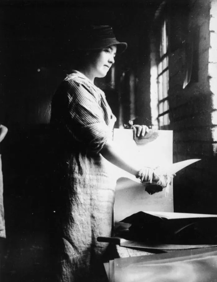 Female Sheet Metal Worker Opening Tin Plates At The Beaufort Tin Plate Works In Morriston, South Wales