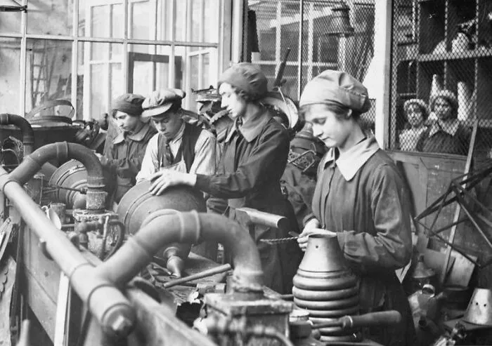 Female Gas Fitters Stripping And Cleaning Street Lamps And Preparing Them For Reglazing In A Gas Works