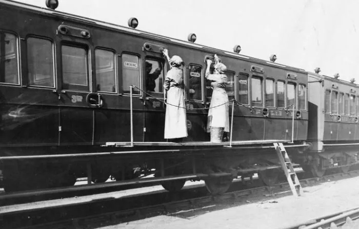 Female Railway Workers Of The Lancashire And Yorkshire Railway Cleaning The Outsides Of Railway Carriages In The Sidings At Manchester