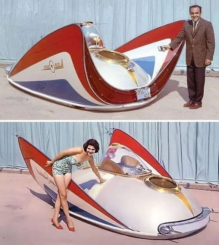 Vintage futuristic car from a classic old-timey photo with a man and a woman posing, evoking June Cleavers vintage closet era.