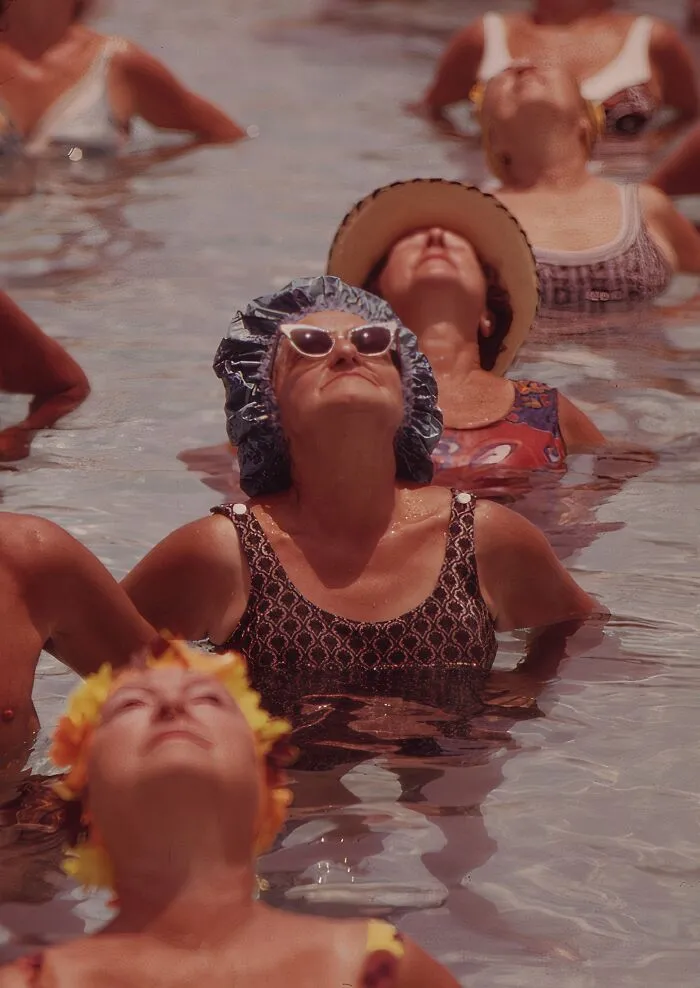Residents Take Part In Organized Daily Exercises In One Of The Public Pools At Century Village Retirement Community, Palm Beach, Florida, 1973