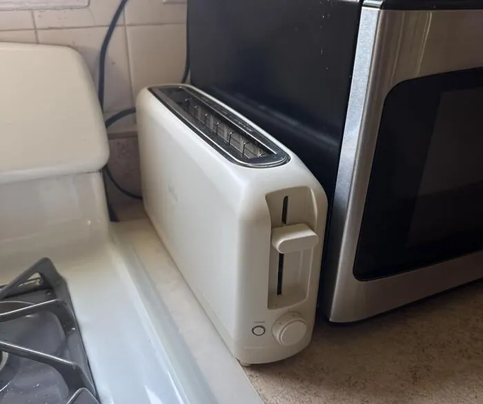 Finally, A Kitchen Appliance That Understands The Dorm Room Real Estate Crisis; This <a Style="Display:inline;" Href="Https://Www.amazon.com/Toaster-Fits-Anywheretm-Kitchenware-Setting-Removable/Dp/B0cyjbb2jq?ie=utf8&th=1&linkcode=ll1&tag=bpdog-20&linkid=e01e0bc16d3084ef5163c8d350a38d13&language=en_us&ref_=as_li_ss_tl" Target="_blank">  <span Style="Font: Inherit; Color: #d74b1f;"> 2 Slice Slim Toaster </Span> Takes Up Less Precious Counter Space Than Your Emotional Support Stanley Cup
