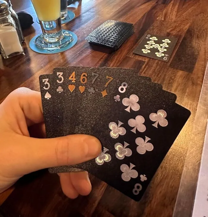 Dealing A Hand Of <a Style="Display:inline;" Href="Https://Www.amazon.com/Bierdorf-Diamond-Waterproof-Black-Playing/Dp/B07lbndhph?ie=utf8&th=1&linkcode=ll1&tag=bppanther-20&linkid=701119fec9a37612c26c25f3e80f5673&language=en_us&ref_=as_li_ss_tl" Target="_blank">  <span Style="Font: Inherit; Color: #d74b1f;"> Shimmering Black Playing Cards </Span> Feels Less Like Game Night And More Like You're About To Reveal A Diabolical Plan To Your Enemies