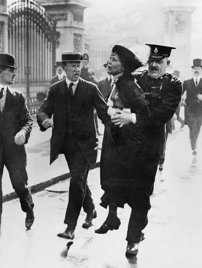 Mrs. Emmeline Pankhurst, Leader Of The Women's Suffragette Movement, Is Arrested Outside Buckingham Palace While Trying To Present A Petition To King George V, 1914